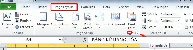 Bước 2: Chọn tab Page Layout > Bấm vào biểu tượng mũi tên nhỏ ở Page Setup.