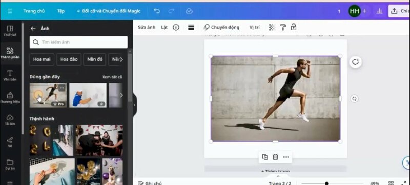 Bước 2: Hãy bấm vào Thành phần > Bấm vào mục Ảnh > Bấm chọn hình một anh chàng đang chạy để đưa vào thiết kế. 