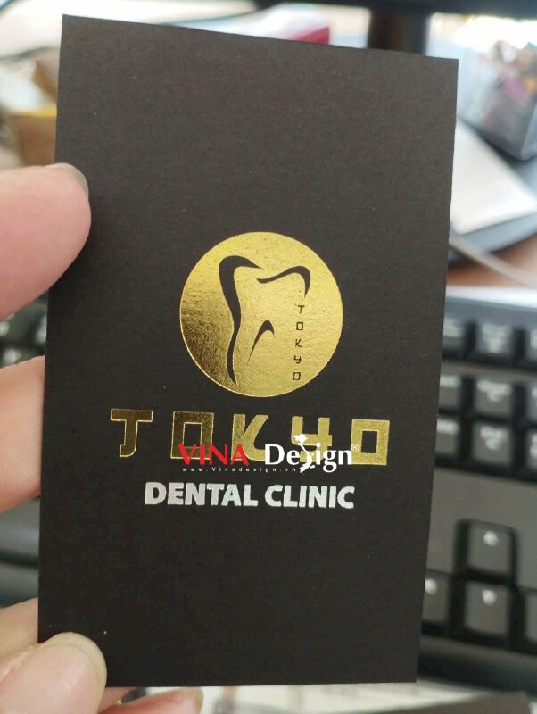 In name card giấy mỹ thuật đen ép kim vàng bạc, name card chức danh DR. nha khoa thẩm mỹ Dental Clinic - VND763