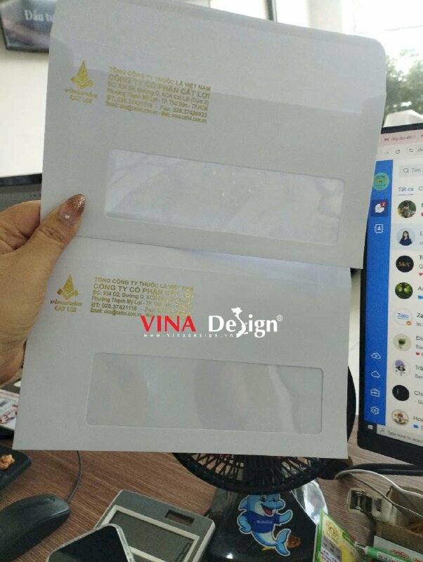Làm bao thư ép kim màu vàng 18K size 12cm x 22cm cho công ty - VND949